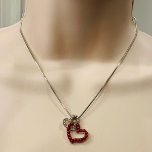 Double heart necklace on silver chain